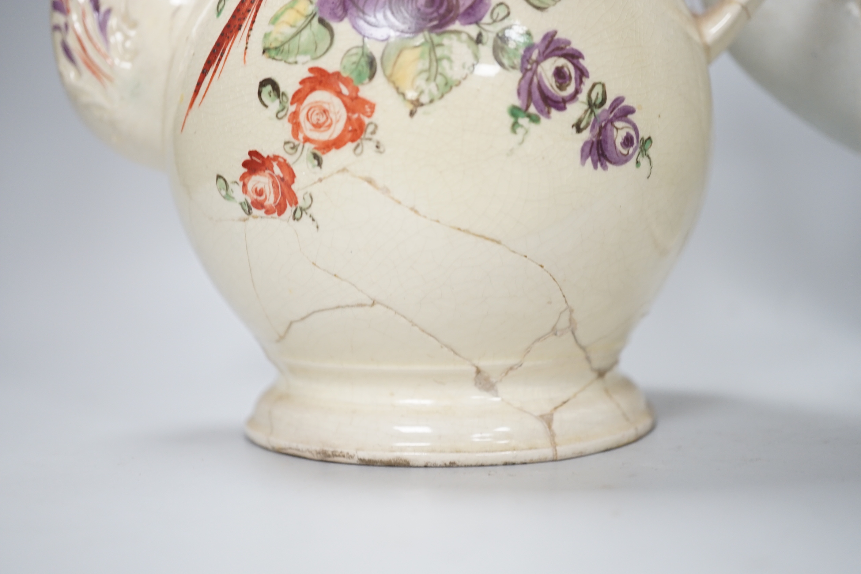 Three Georgian creamware and pearlware teapots, a jug and a mug, tallest 27cm